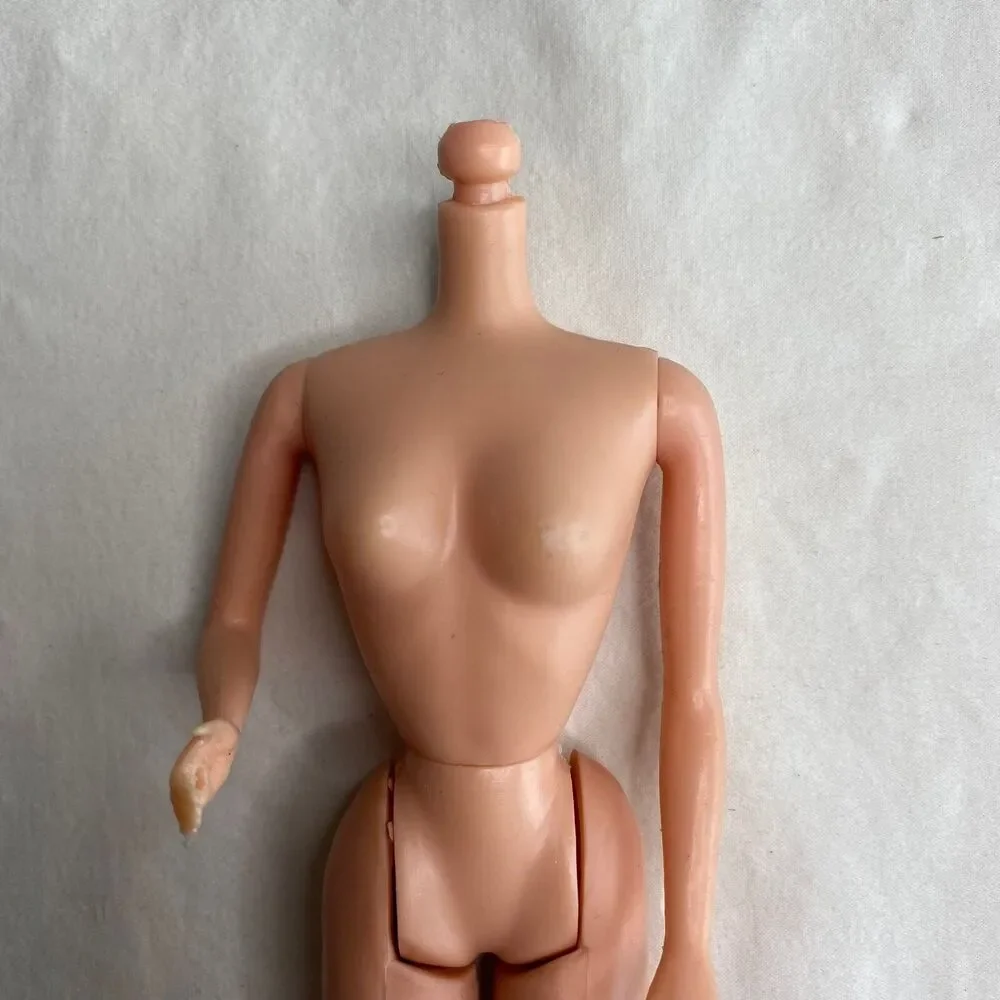 Marie Osmond Barbie Body Made in Korea 1973-1978. No head. Copyright 1966